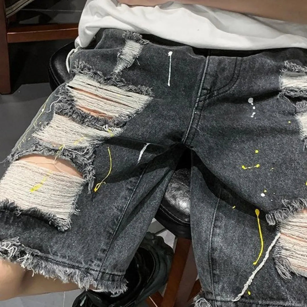 Men's water washed hole denim shorts in loose fit street style