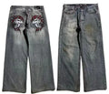 Men's grey washed-out wide-leg straight-cut denim jeans on a neutral background.