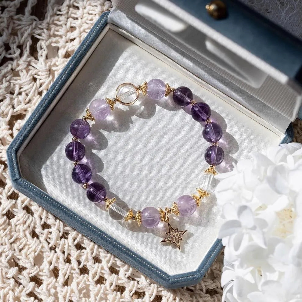 Women's eight Awn star artificial crystal bracelet in a gift box.