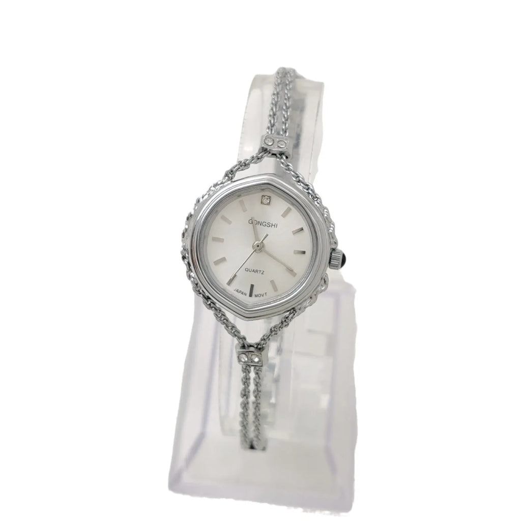 Women's Mori style quartz watch with 25mm dial, mineral glass face, and metal chain strap