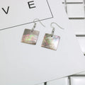 Geometric shell drop earrings in Square Panther or Rectangular Shell designs
