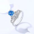 Sterling silver crown moissanite ring for women in white, blue or pink, sizes 6 to 9