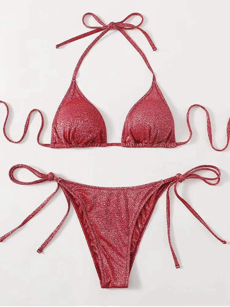 Women's split bandage style bikini swimsuit in polyester fabric on a mannequin.