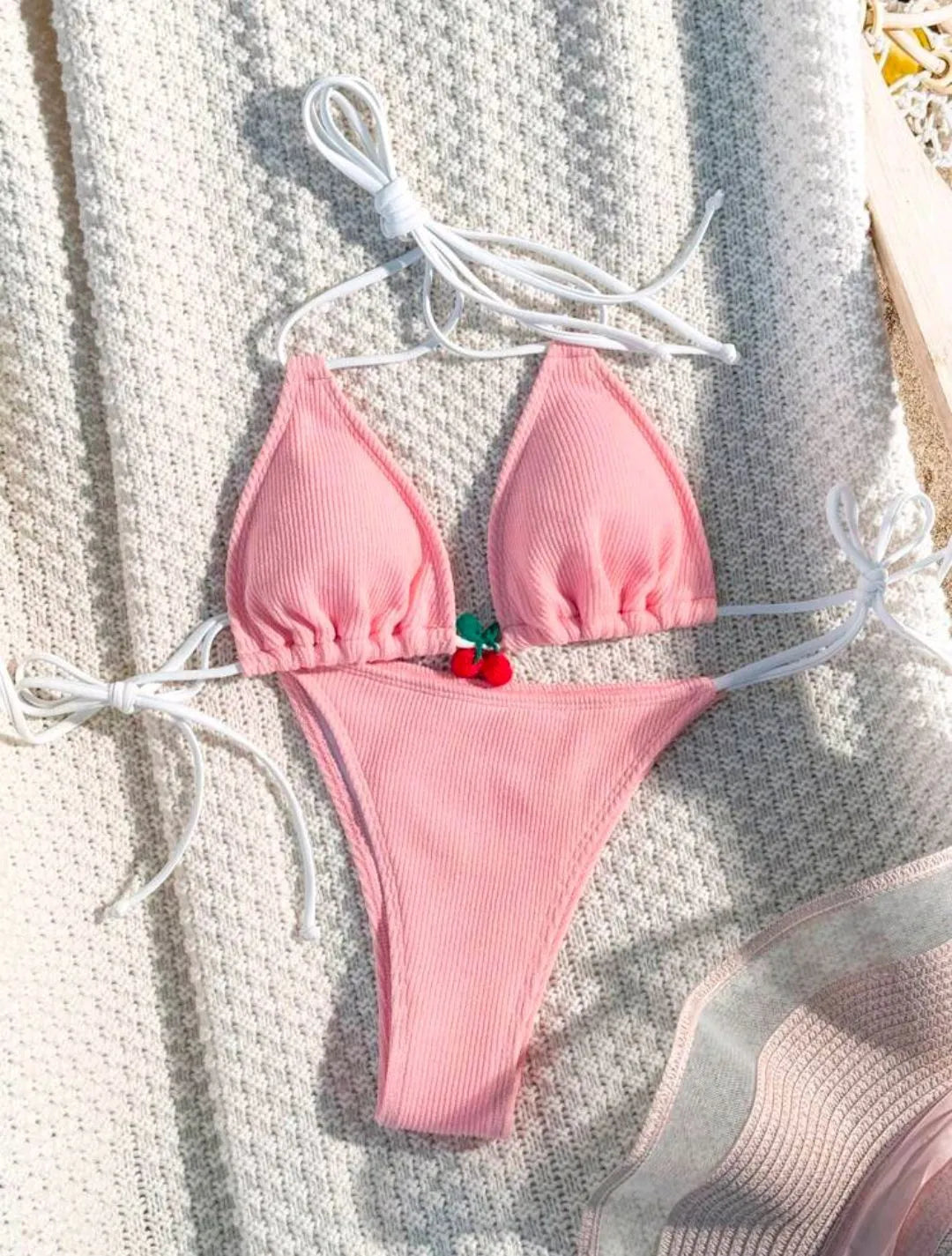 Solid colour nylon bikini briefs swimsuit in briefs style on a mannequin.