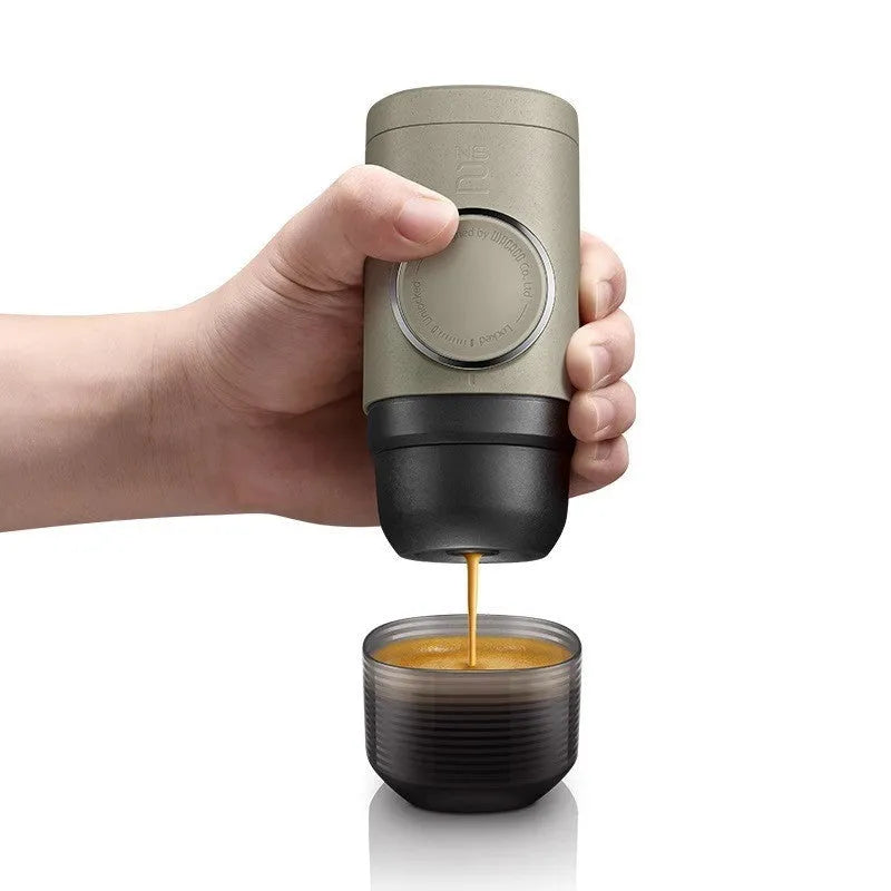 Manual espresso portable capsule coffee machine in olive gray with built-in cup and storage bag