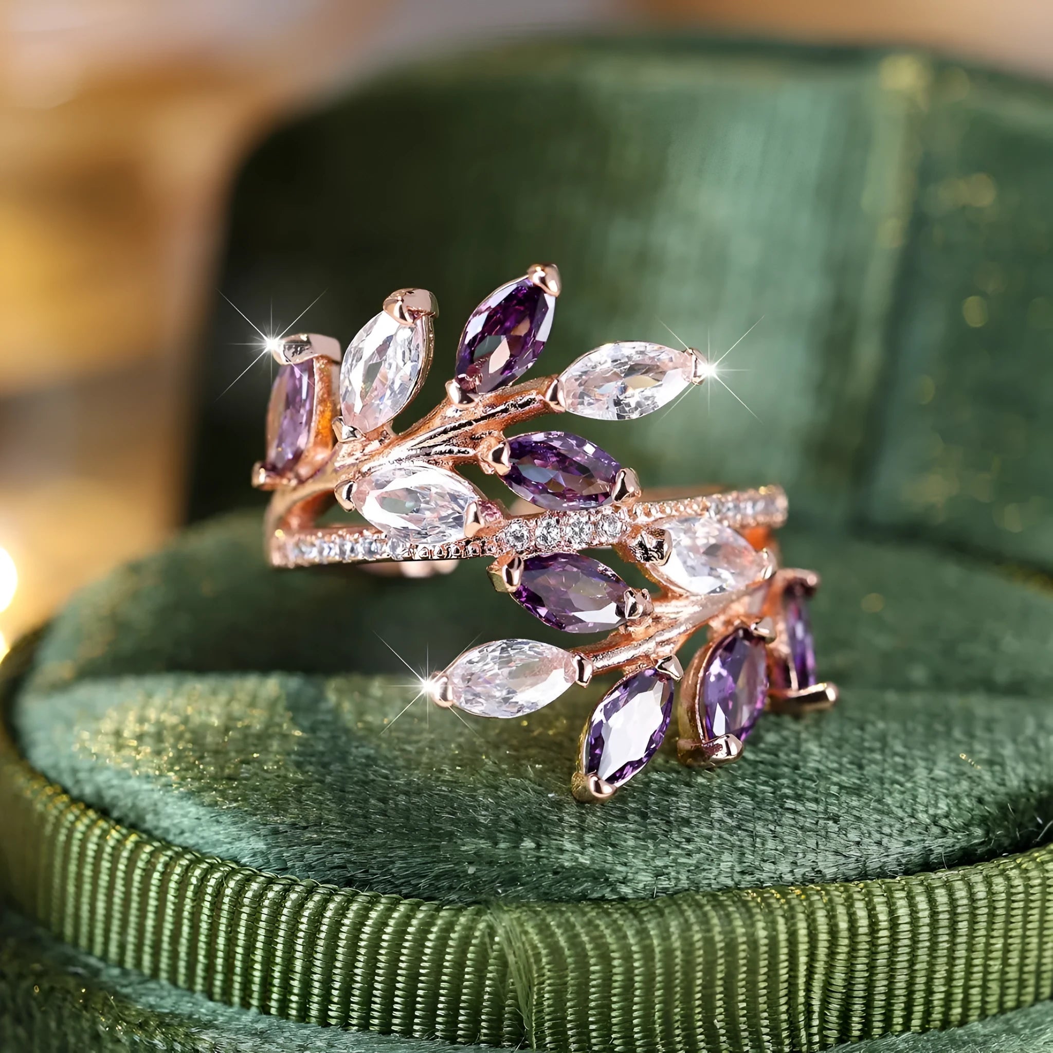 Adjustable copper leaf-shaped ring with a Horse Eye Zircon stone, shown in a rose gold finish.