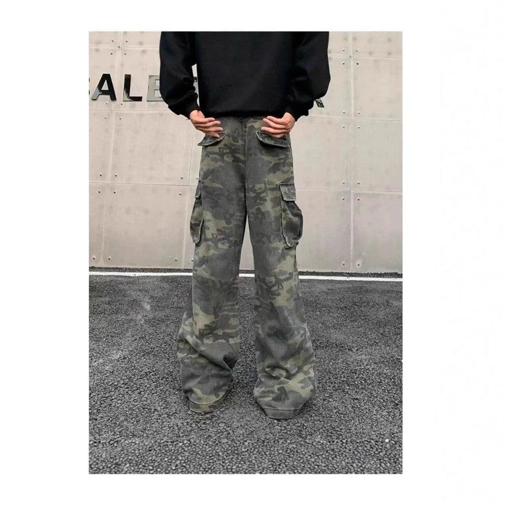 Cotton blend cargo trousers with washed camouflage print and multiple pockets.