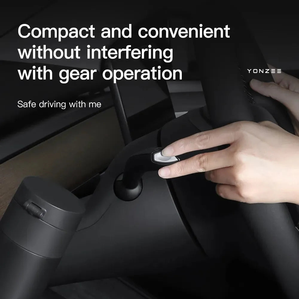 Plastic water cup holder for Tesla Model 3 and Model Y dashboard with a carrying handle.