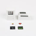 Transparent Macintosh-style mechanical keyboard keycap in black, retro, or white colour options