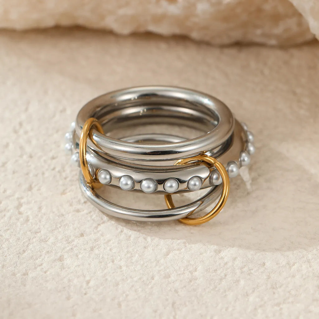 Stackable stainless steel ring with 18K gold plating in three colour options for women