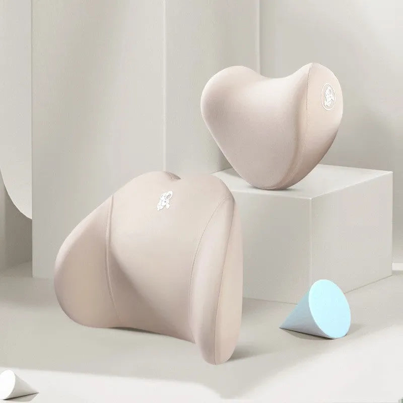 Heart-shaped car pillow set in various colours for lumbar and headrest support.
