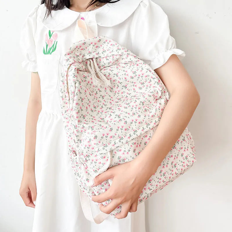 Floral nylon school backpack for girls, 20-35L breathable summer simplicity bag in tulip, floral, and small flower style.