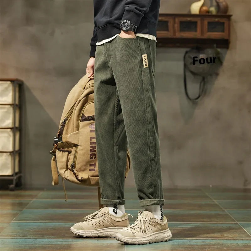 Corduroy men's casual trousers in street fashion style with straight leg opening and tapered cut