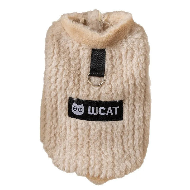 Two-legged sleeveless fleece dog vest with integrated leash ring in soft green or neutral beige, sizes XS to XL