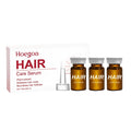 Three 5ml bottles of hair root liquid with ginger and rosemary oils for scalp treatment.