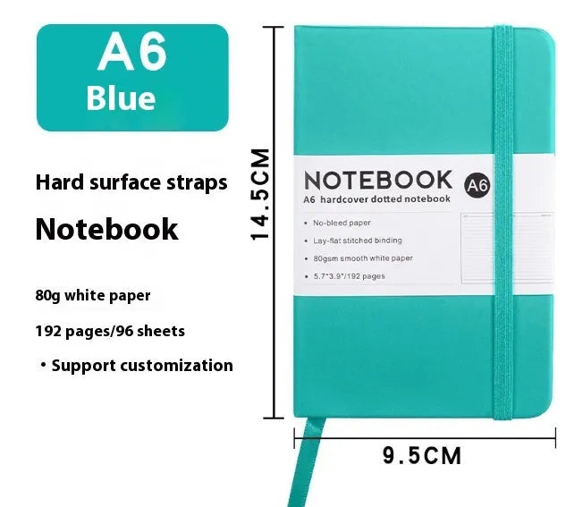 A5 soft touch PU leather strap diary open showing lined pages, closed with elastic band, in a choice of colours.