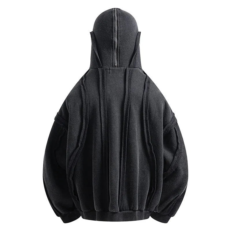 Black loose-fit men's hooded cardigan coat with a zip front on a model.