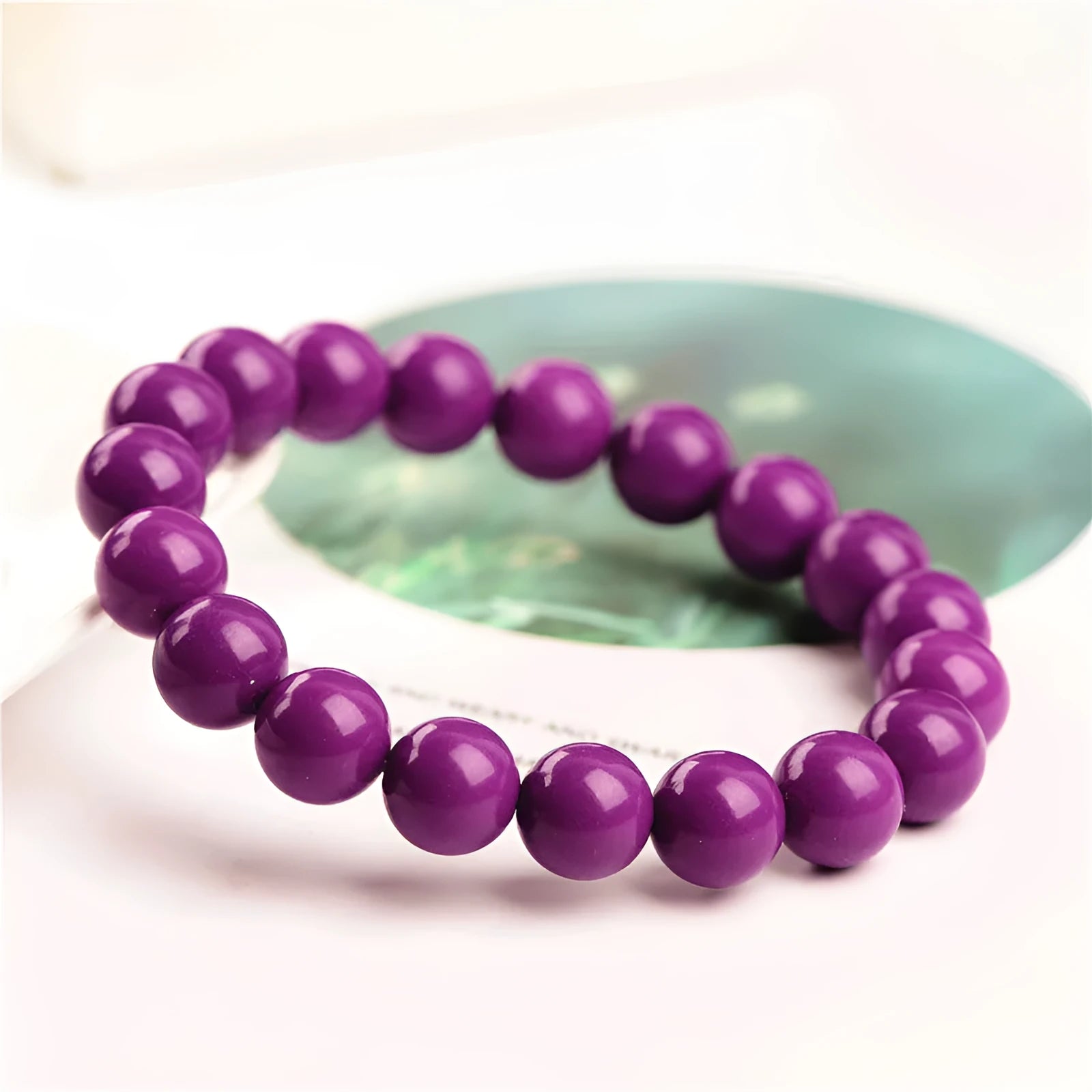 Jiuya polished purple mica crystal bracelet showing single circle design on a wrist.