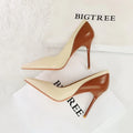 Retro black and creamy-white women's stiletto pumps with pointed toe for banquets