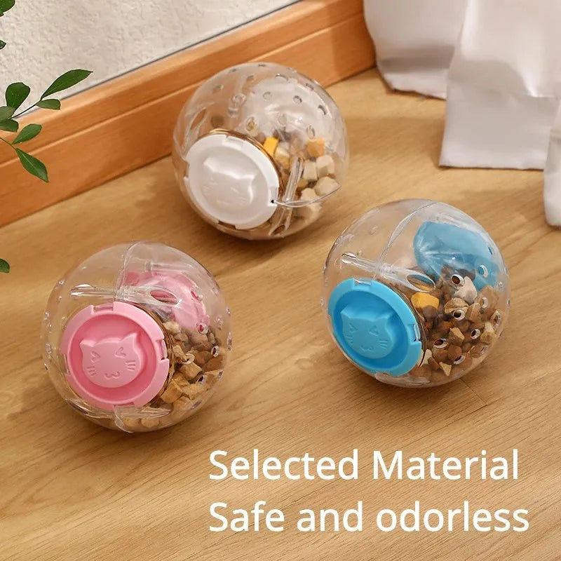 Blue ABS plastic slow feeding ball for dogs and cats, 11.5cm in diameter, on a plain background.