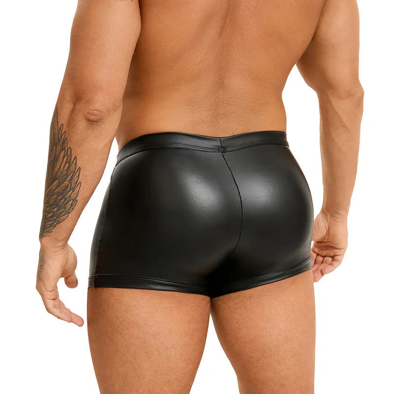 Black men's leather-look shorts with U-pouch front design on a model