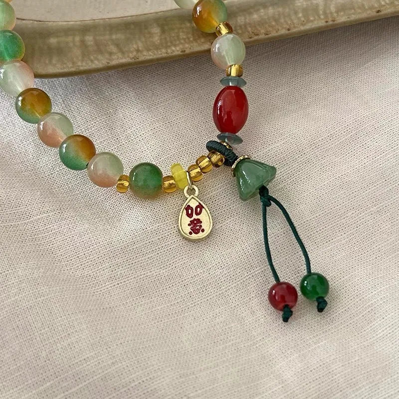 M990 Lotus Ruyi bracelet showing lotus decorative elements and mixed material construction
