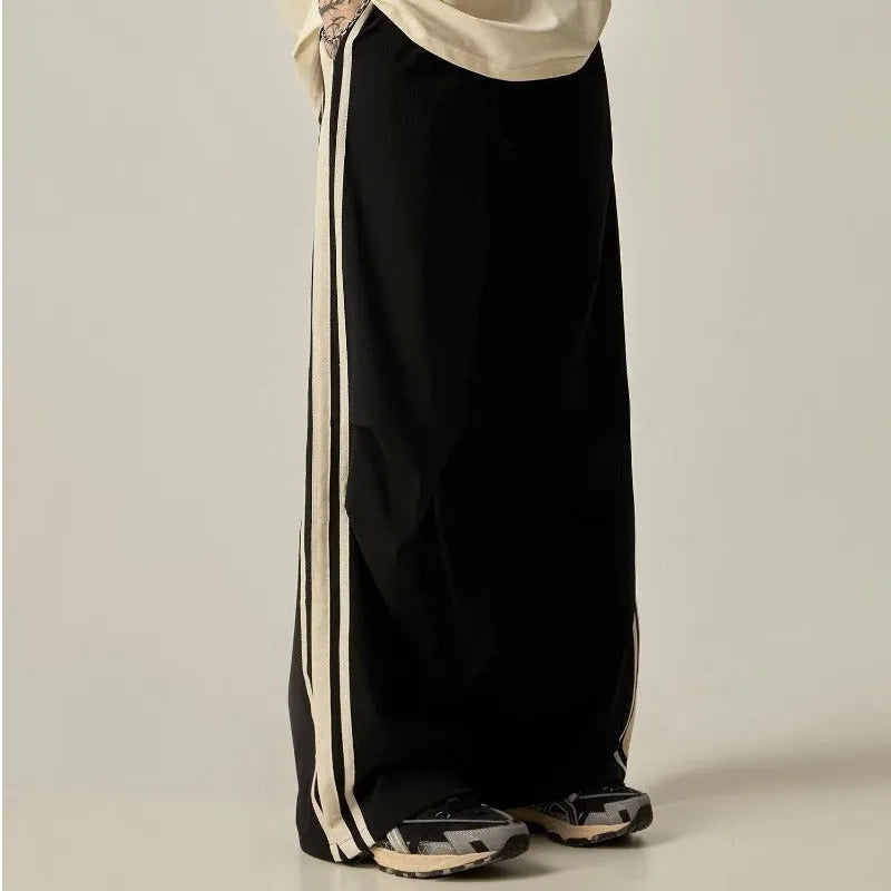 Black wide leg climbing trousers for men with high waist and straight leg design