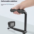 Black folding tripod with GoPro camera bracket shown extended for use and folded for storage