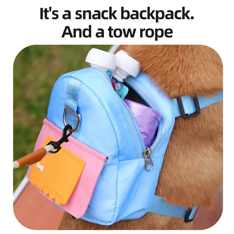 Blue adjustable dog harness backpack with breathable mesh panels and a tow rope attached.