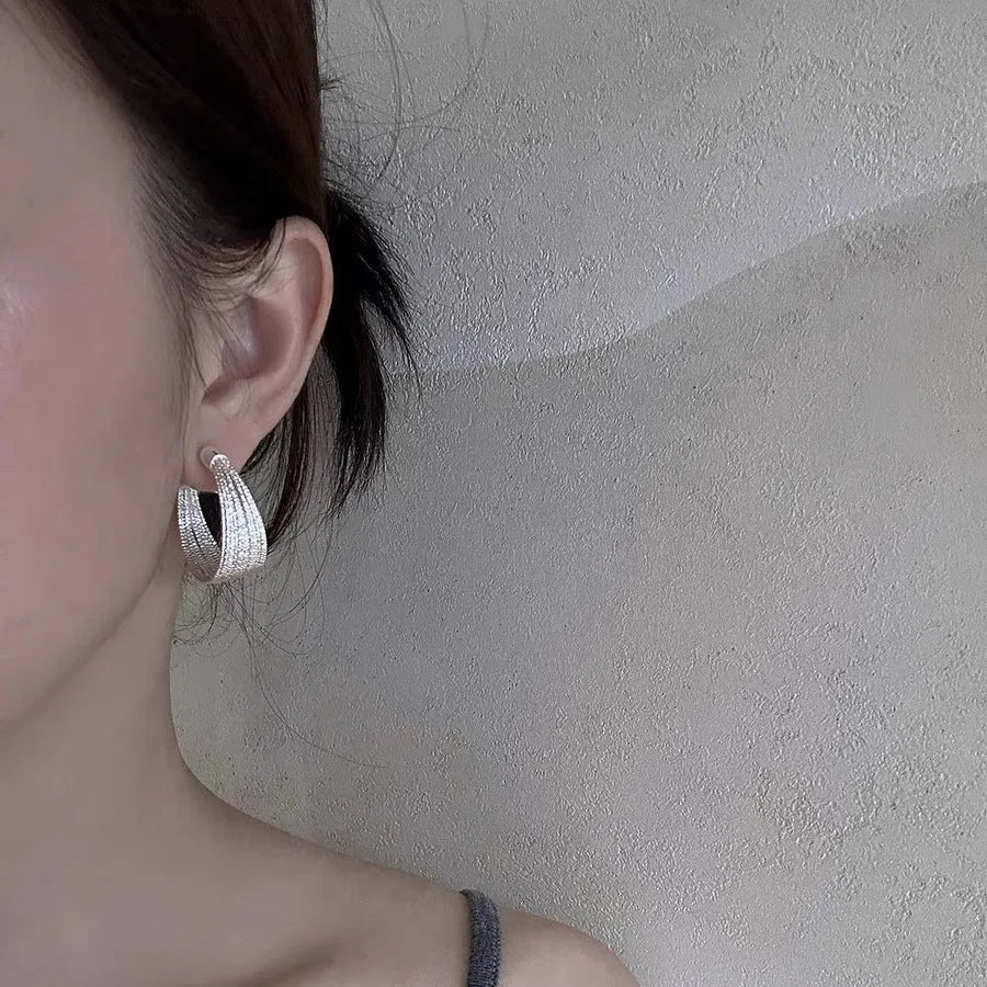 Geometric multi-layer copper earrings with stud and clip options in silver and gold finishes