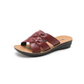 Women's cowhide slippers in beige, black, or red colours with non-slip soles and imitation leather lining