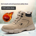 Lightweight brown leather labour protection safety shoes with a rubber sole on a work surface.