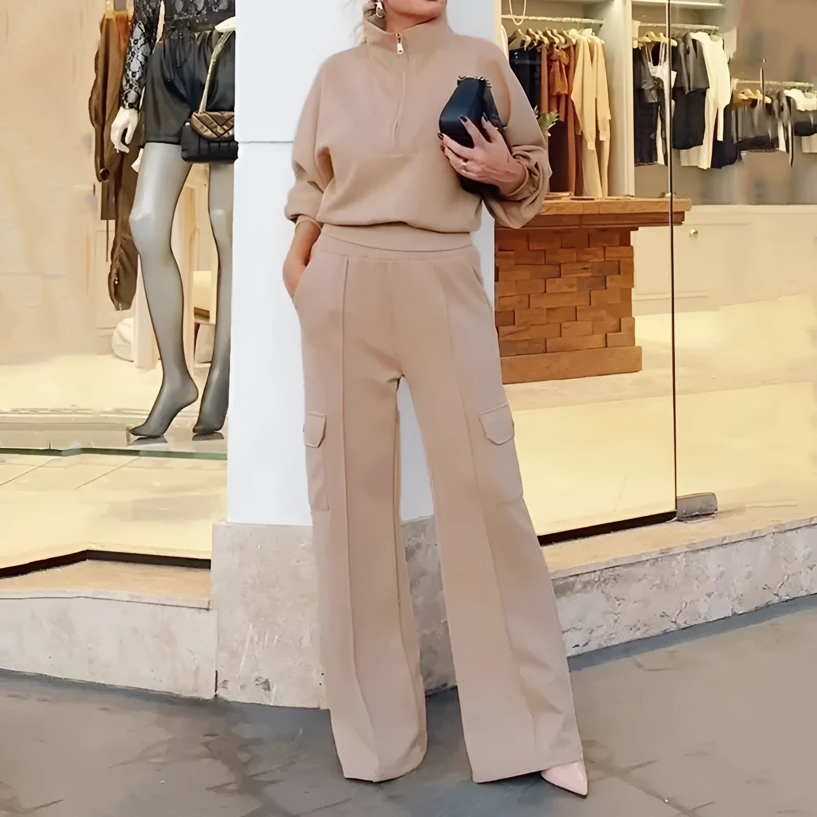 Light camel women's lapel top and wide-leg trousers two-piece workwear set on a hanger.