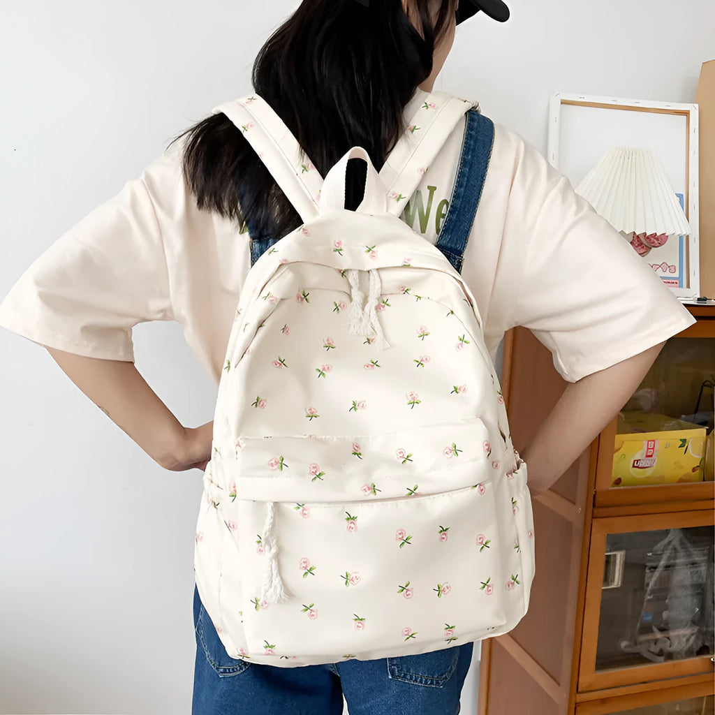 Floral nylon school backpack for girls, 20-35L breathable summer simplicity bag in tulip, floral, and small flower style.