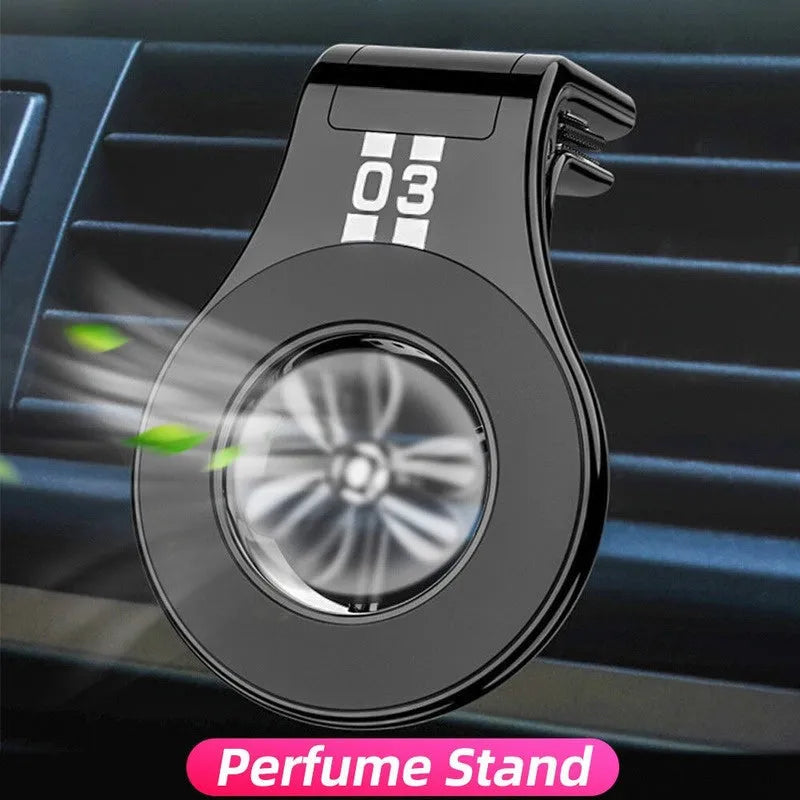Black magnetic car phone holder mounted on vehicle air vent with smartphone attached