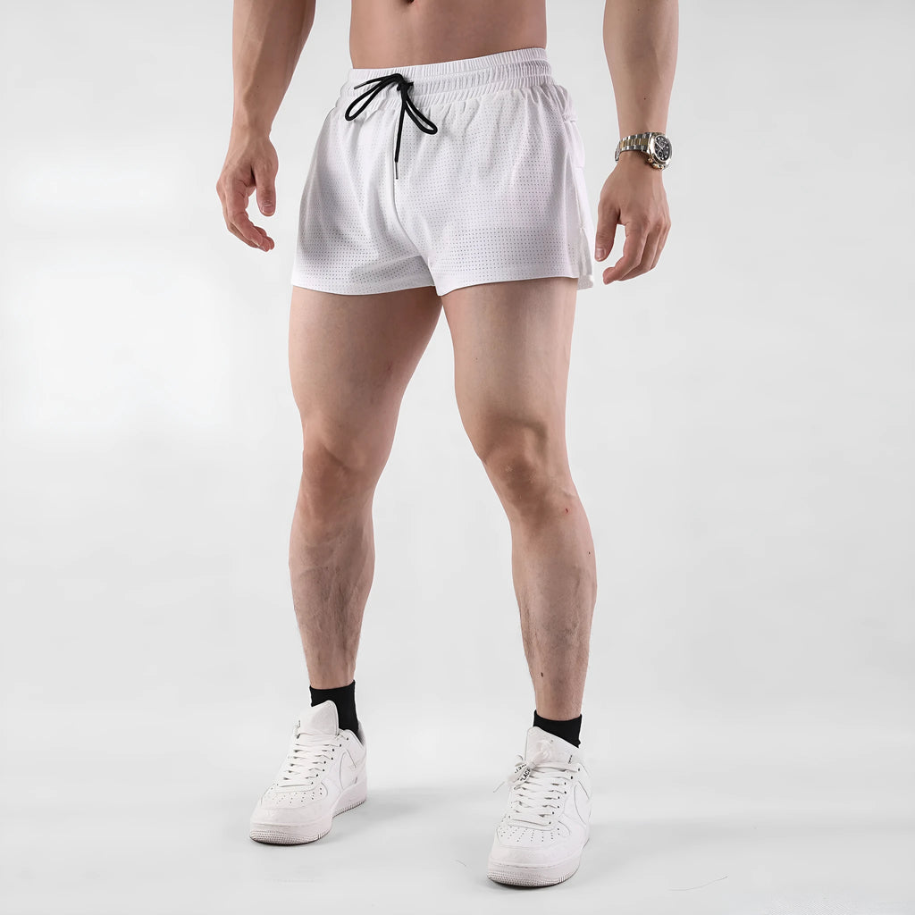 A pair of men's black quick-drying nylon shorts with a mid waist, laid flat.