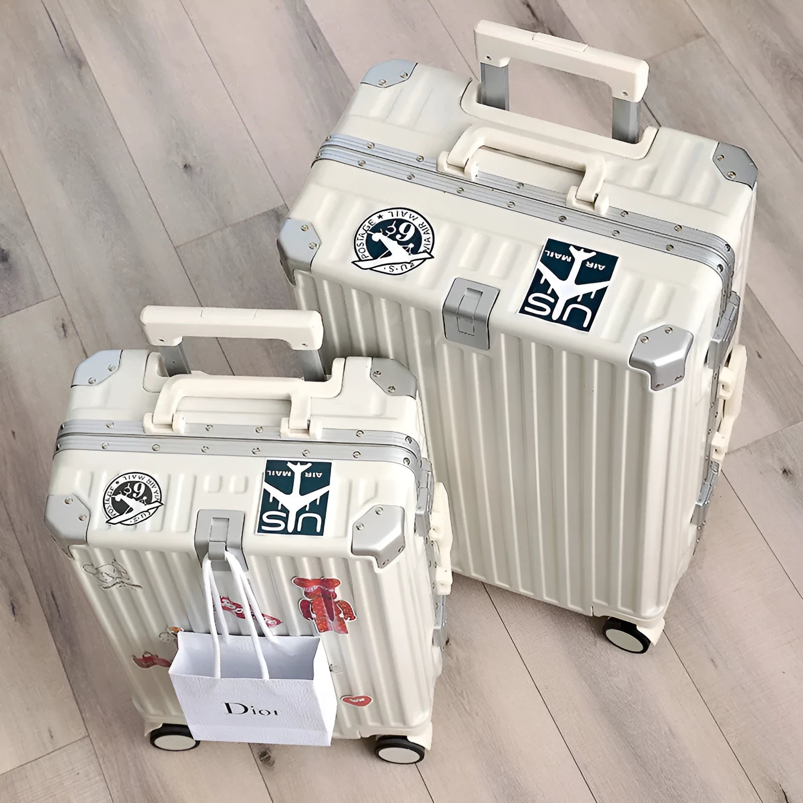 Aluminium frame hard shell ABS PC suitcase in avocado green with universal wheels.