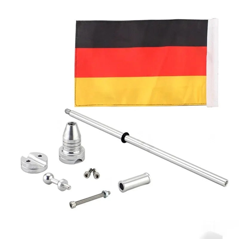 Black and silver chrome vehicle tail box flagpole for mounting on bumpers or luggage racks.