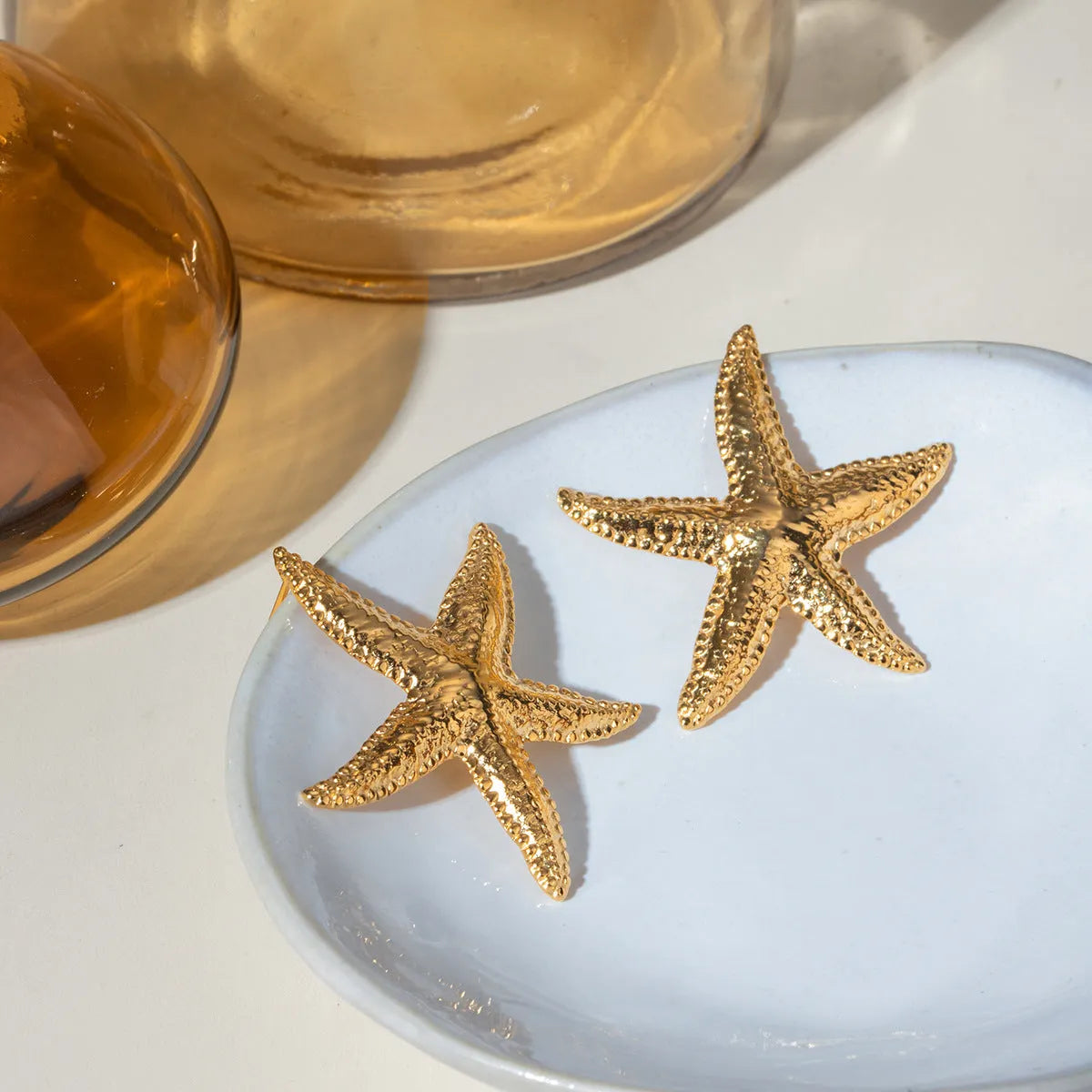 Gold starfish earrings for women stainless steel electroplated animal zodiac style daily wear