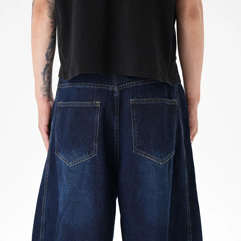 Washed distressed dark blue wide leg women's jeans with loose fit and denim fabric
