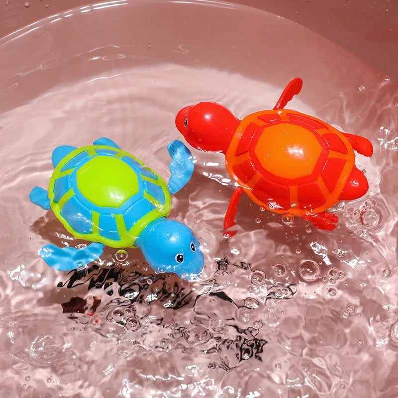Small green plastic turtle bath toy for baby water play measuring 12cm
