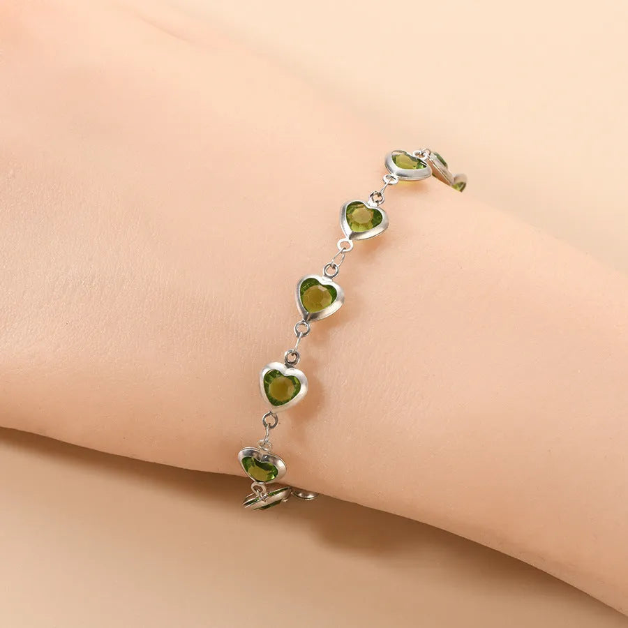 Stainless steel geometric Devil's Eye bracelet shown in one of six colour options: colourful, blue, green, red, light green, or light blue.