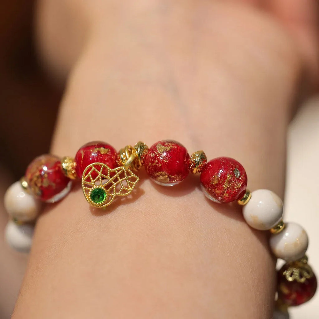 Gold foil coloured glaze ethnic bracelet for women with geometric design and Xingshi elements