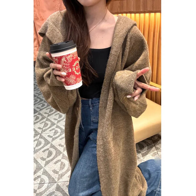 Korean style long hooded cardigan for women in a wool blend fabric, shown in oatmeal colour.