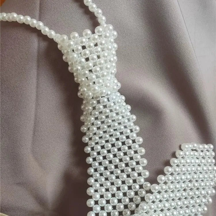 Women's pearl tie body chain jewellery with hollow-out design and alloy fastening
