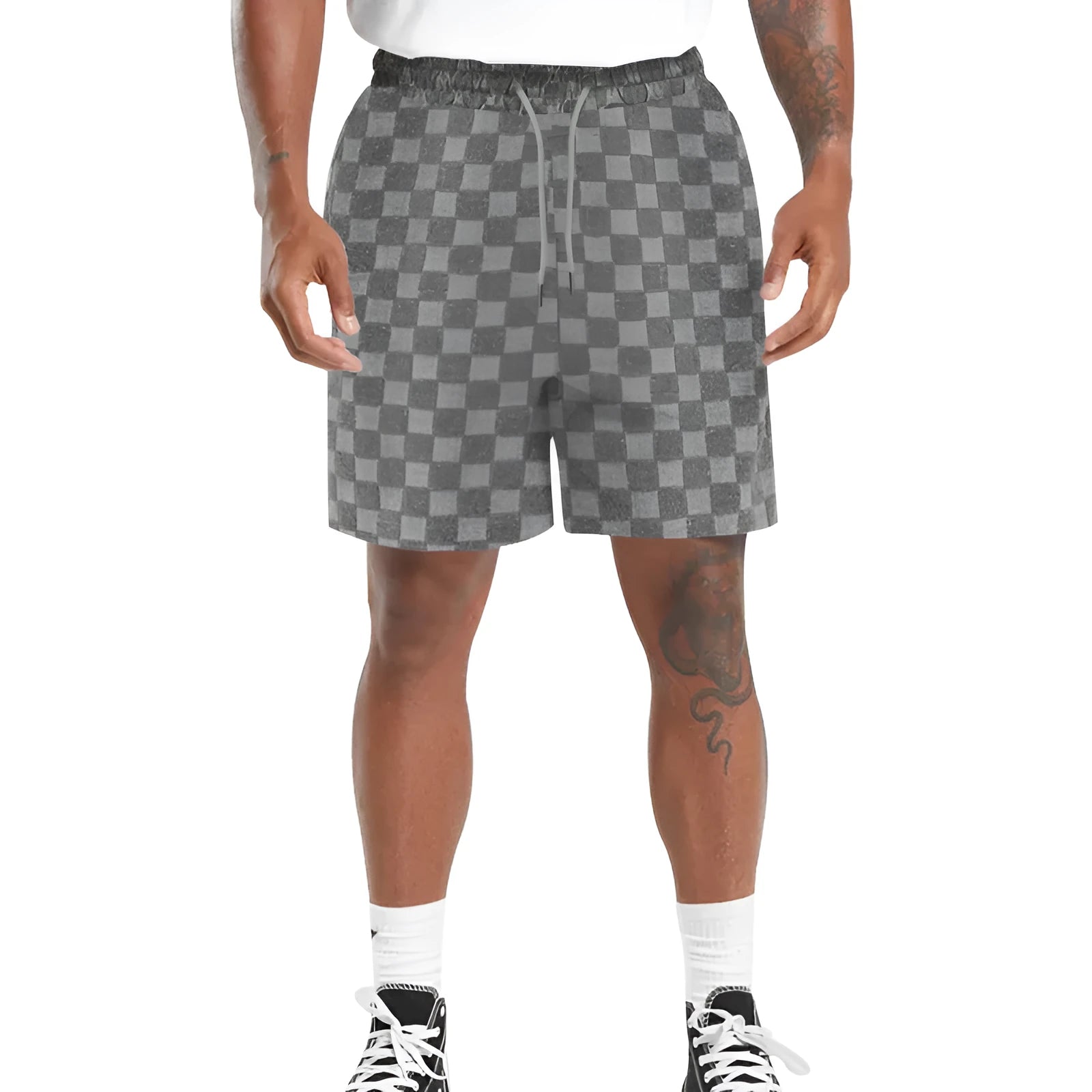 Men's black and white checkerboard plaid loose sports shorts with an elastic waistband.