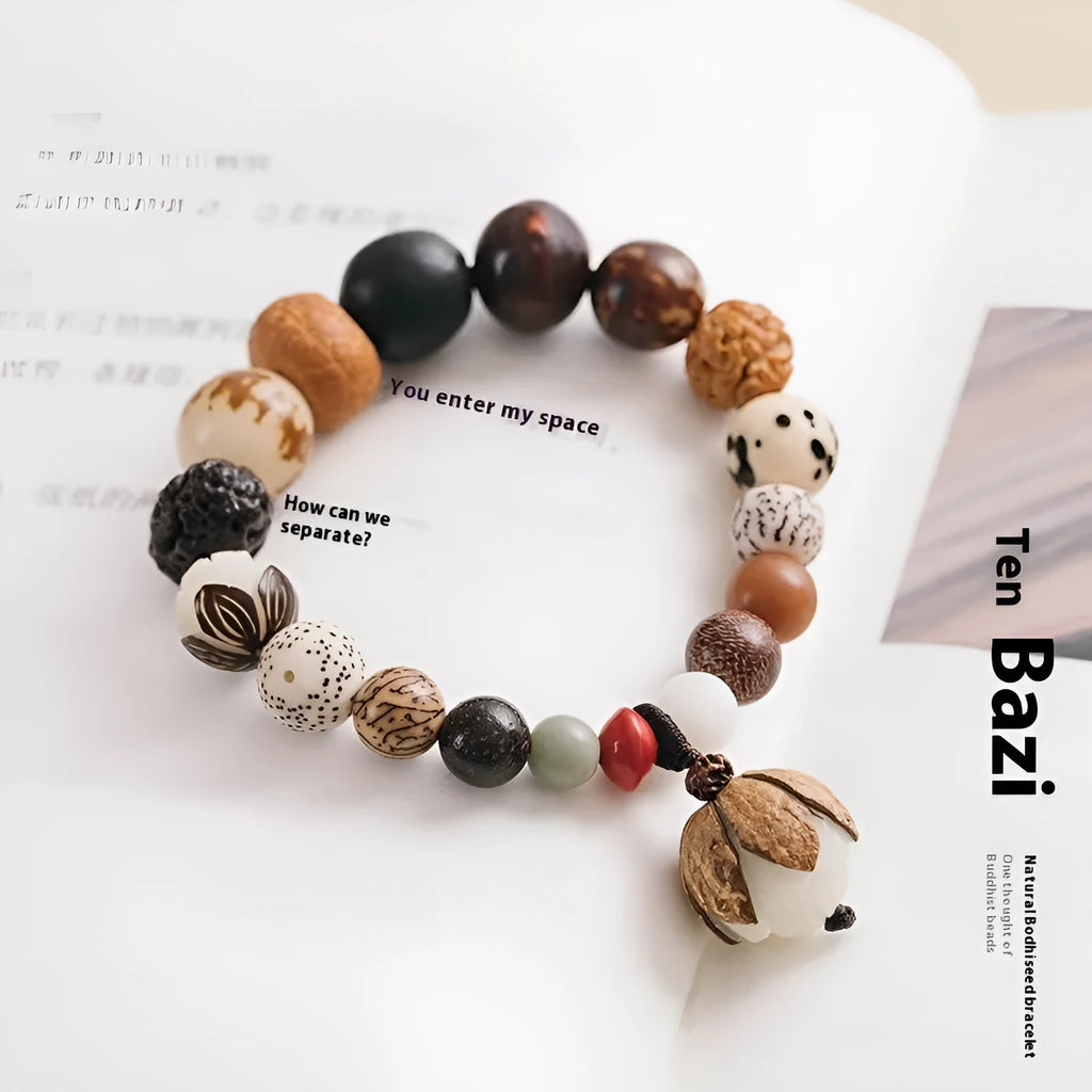 Handmade Bodhi seed bracelet with 18 natural beads in geometric pattern measuring 16cm