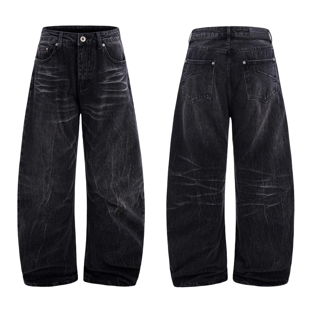 Black men's straight-leg jeans with a distressed lightning crack pattern on the legs.
