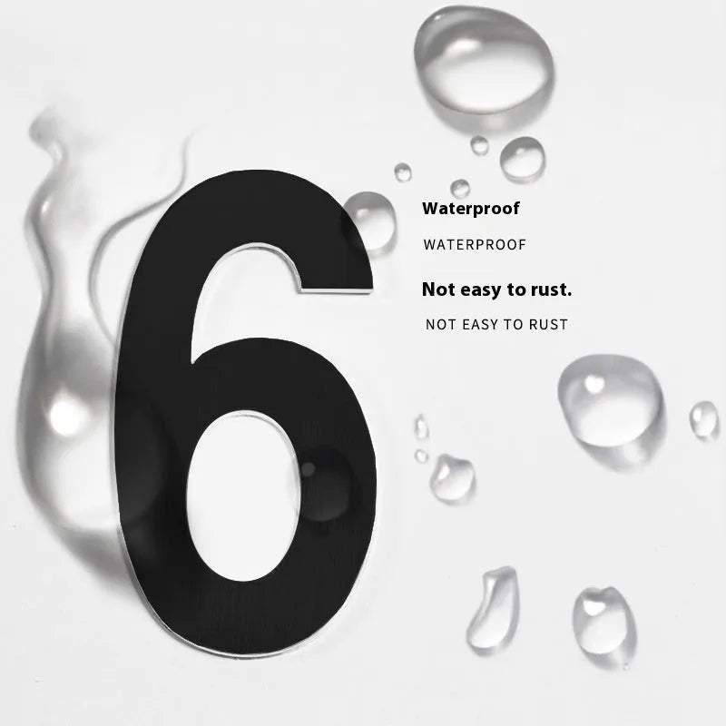 Black stainless steel sticky house numbers showing 7.5cm characters including letters and numbers
