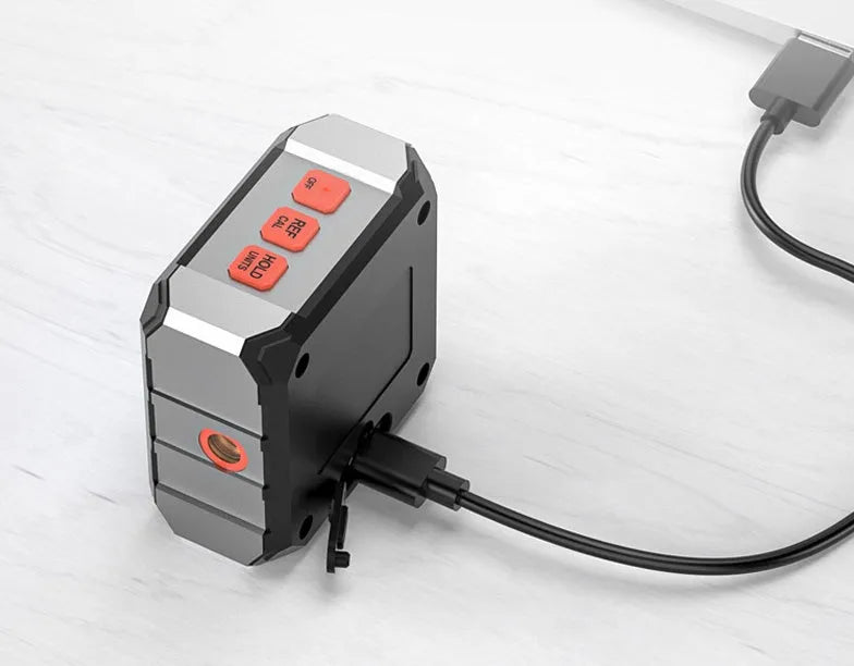 Digital laser infrared inclinometer tool with alloy casing and a display showing measurements.